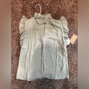 Halogen twist neck ruffle sleeveless top.